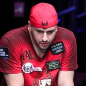 Michael "The Grinder" Mizrachi is the male Shannon Elizabeth when it comes to sponsorships: Absolute Poker, Planet Hollywood, all the shit on his shirt above, Deliverance, Full Tilt, and now the Breeders' Cup.