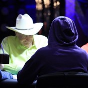 It's all smiles for Doyle Brunson, who survived another day.